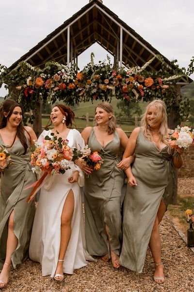 Hope Farm in Dorset wedding with bridesmaids in green dresses.