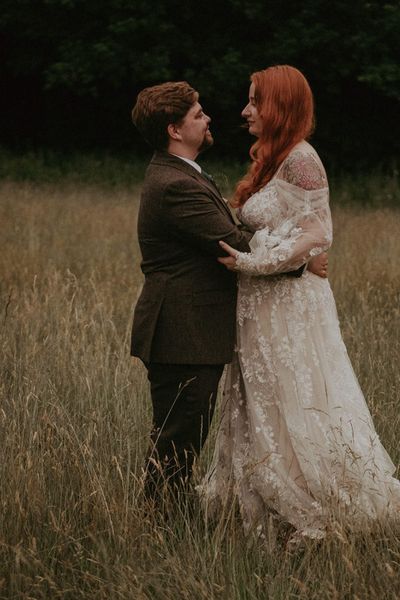 Lila's Wood outdoor wedding with the bride in boho lace wedding dress and groom. 