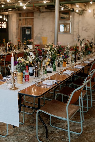 Wildflower wedding theme at Holmes Mill wedding with botanical tablescape.