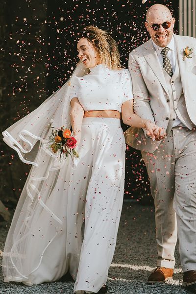 confetti moment for bride and groom