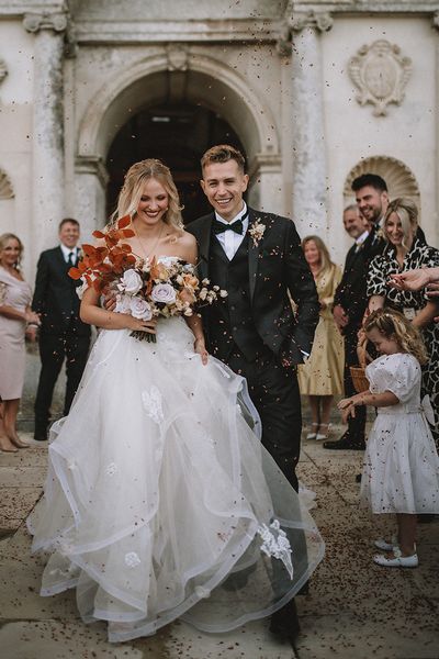 Vamps star James McVey wedding to model girlfriend Kirstie Brittain at Lulworth Castle with a bespoke wedding dress by Divine Day Photography