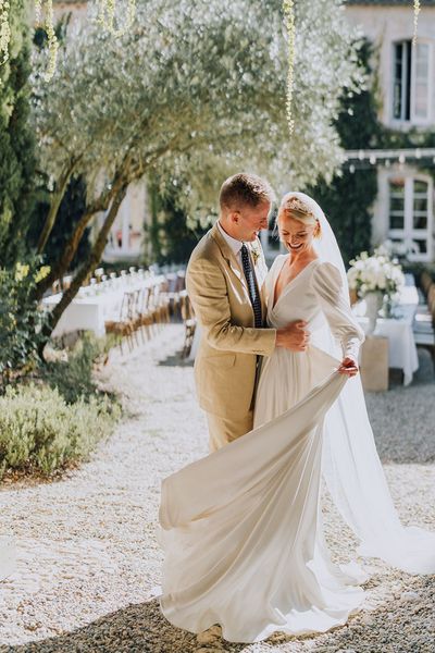 Château de Malliac destination wedding with green satin bridesmaid dresses and a bespoke Emma Beaumont bridal gown by Clara Cooper