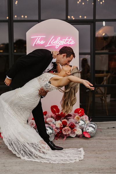 Botley Hill Barn wedding with pink and red theme with heart shaped wedding decor