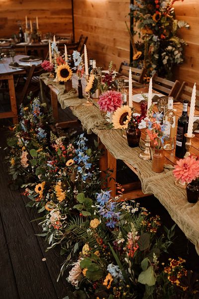 Seasonal flowers for rustic wedding tablescape.