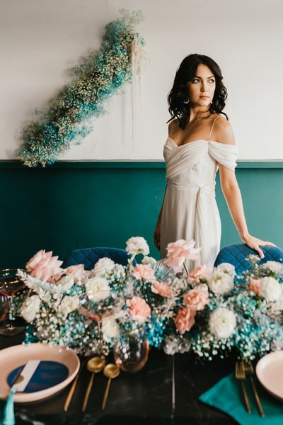 pink and teal wedding inspiration with gypsophila flowers, disco balls and stylish wedding dresses 