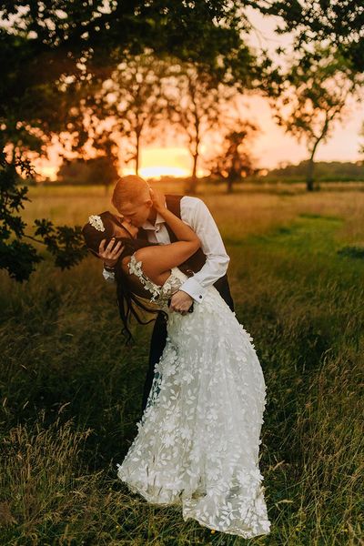 Reymerston Hall wedding with golden hour photos of bride and groom
