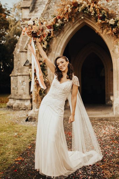 Bride in autumn wedding dress with beaded embellished decor