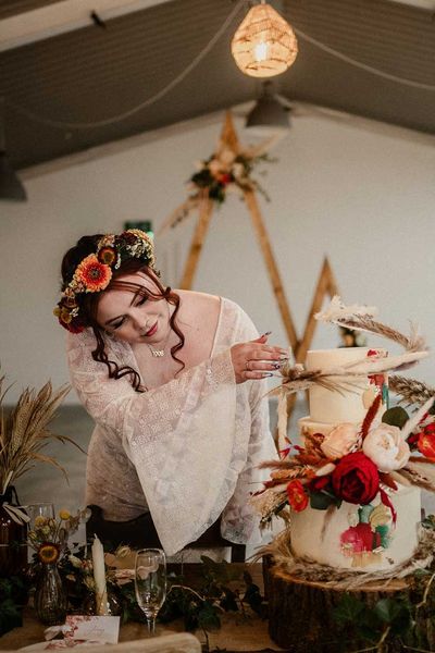 the barn at Harburn wedding with floral moongate 