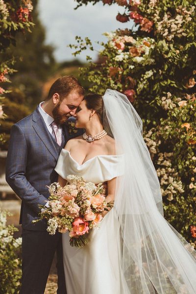 Bride wearing a pearl choker necklace by Vivienne Westwood