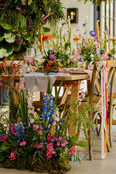 Fiesta theme wedding with colourful plants and flowers, bright ribbon, lace dresses and contemporary wedding stationery 