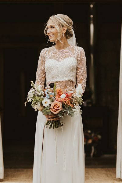 Bride in Catherine Dean wedding dress separates for chic Nancarrow Farm wedding.