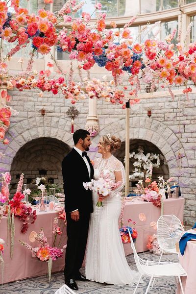 De Vere Tortworth Court wedding with pink flower decorations.