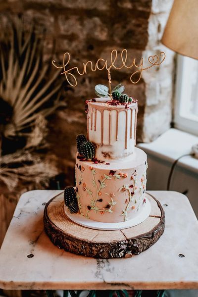 Weddings under 10k roundup with examples from real weddings including this two tier wedding cake