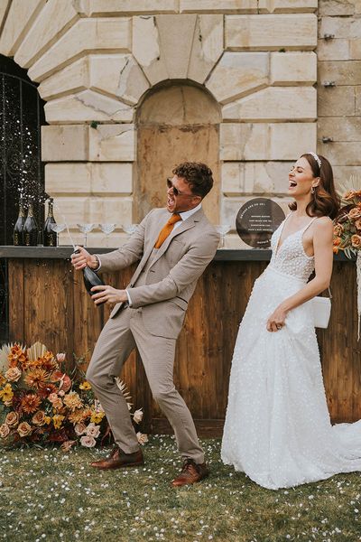 Kirtlington Park wedding inspiration with orange and neutral wedding palette 