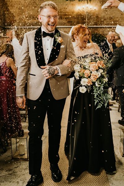 Botley Hill Barn in Surrey wedding with bride wearing black wedding dress