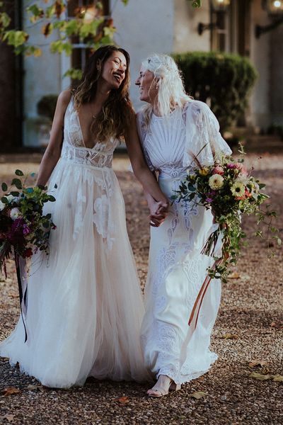 Aswarby Rectory wedding with two brides in boho lace wedding dresses