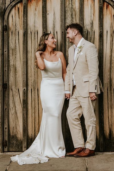 Shustoke Barns wedding with bride wearing a satin slip wedding dress