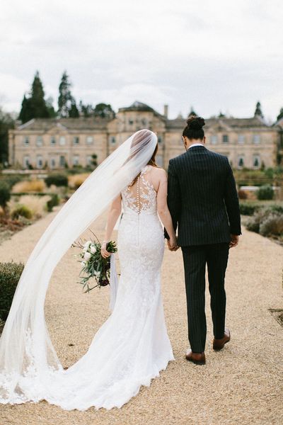 Luxurious Grantley Hall Wedding with elegant wedding cake, flowers and fashion