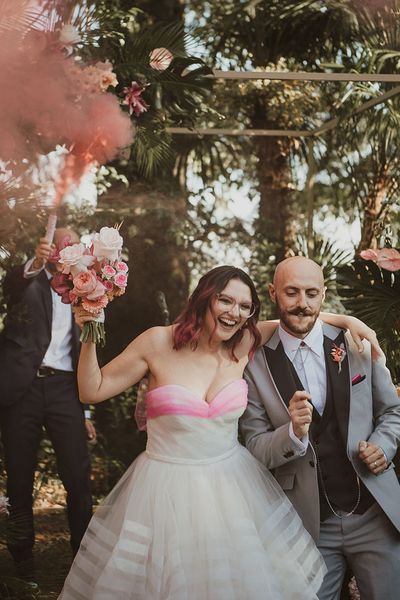 Fun Italian villa wedding with Fuchsia pink details, tropical wedding flowers and smoke bomb wedding photographs by Studio Putino