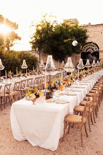 Chandelier installation for destination wedding in Puglia, Italy.