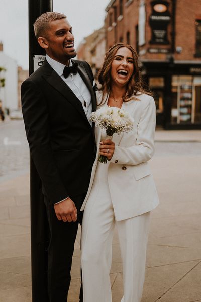 Intimate Sheffield registry office wedding with bridal suit, tuxedo and gypsophila flower crown 