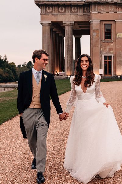 Mansion wedding at The Grange in Hampshire with the bride in a Sassi Holford pearl wedding dress.