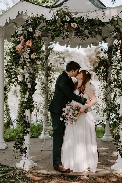 ethereal Preston Court wedding venue with neutral wedding flowers