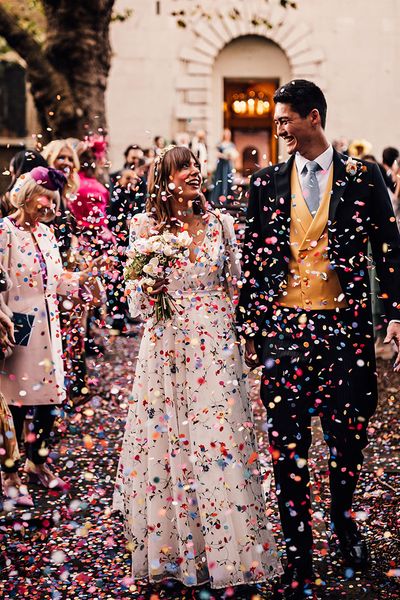 Crypt On The Green wedding with bright confetti exit