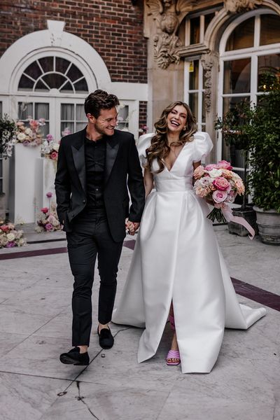 Stylish Mayfair wedding inspiration with Love In Lace Bridal gown with pockets and peeled back blush roses