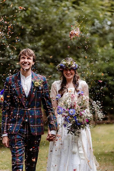 sustainable wedding with Vivienne Westwood tartan suit and secondhand wedding dress