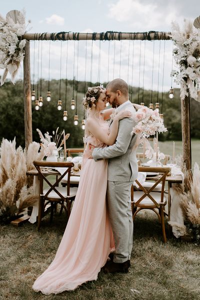 Boho luxe wedding inspiration at Waresley Park Estate with an outdoor reception, floral moon gate and blush wedding dress