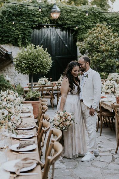 outdoor boho wedding ceremony and reception at La dime de giverny with Catherine Deane wedding dress