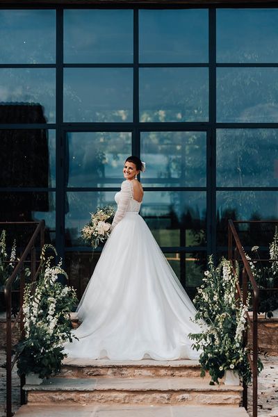 Bride in Emma Beaumont tulle princess wedding dress.