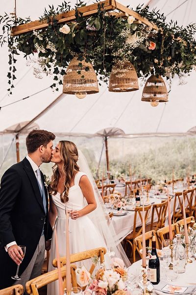 marquee sennen cove wedding with Luanne neville wedding dress, morning suit and pale blue bridesmaid dresses