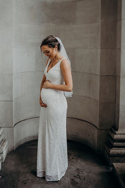 bride in sparkly sequin maternity wedding dress