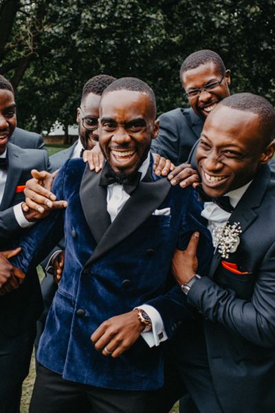 a group of men celebrating together for a stag party