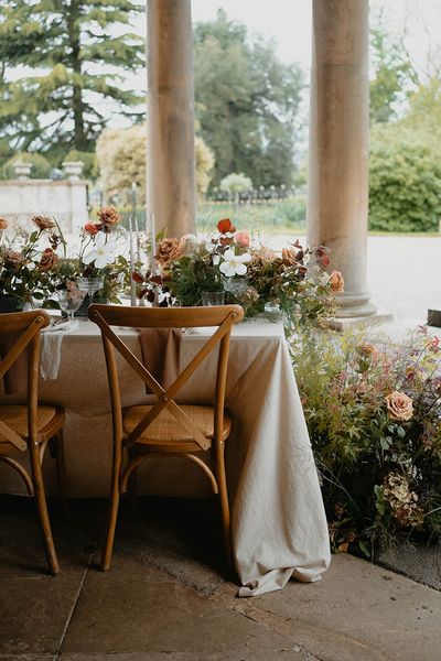 Prestwold Hall botanical wedding inspiration with outdoor tablescape, floral table runner & a lace wedding dress by Safrina Smith Photography