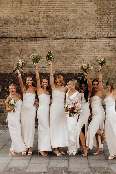 100 Barrington wedding with bridesmaids in neutral bridesmaid dresses