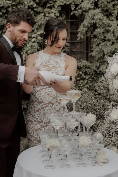 champagne tower at intimate dinner party wedding