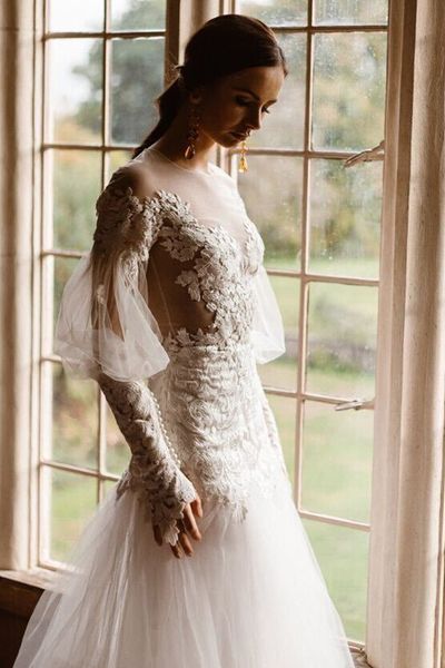 bride in Emma Beaumont dropped waist wedding dress