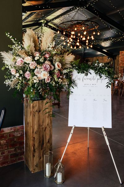 rustic barn wedding with wedding bouncy castle and sweet table