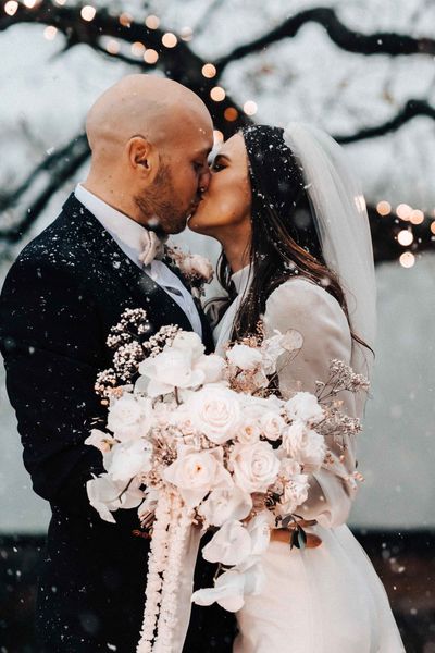 Hollyoak's Actress Jessamy Stoddart wedding at Iscoyd Park in the snow with a sparkly evening dress by James Fear Photography