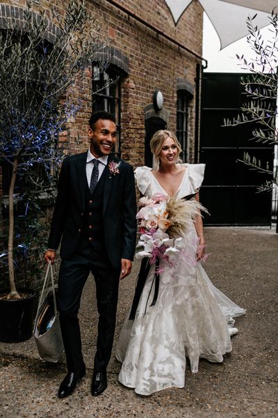 Contemporary London Wedding at The Loft Studios with Ruffle Wedding Dress by Epic Love Story 