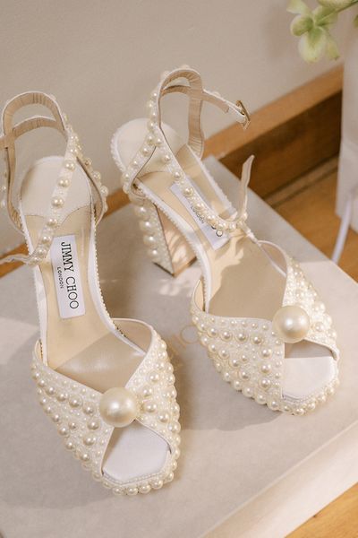 Jimmy Choo pearl shoes with platform heel.