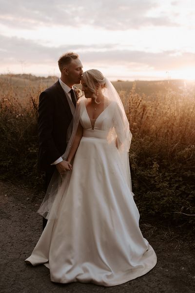 A rustic wedding at Bake Barn during golden hour.