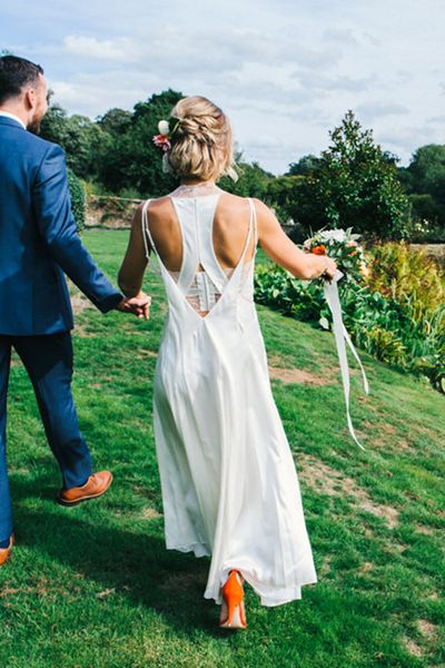 colourful pennard house wedding with bride wearing racerback dress