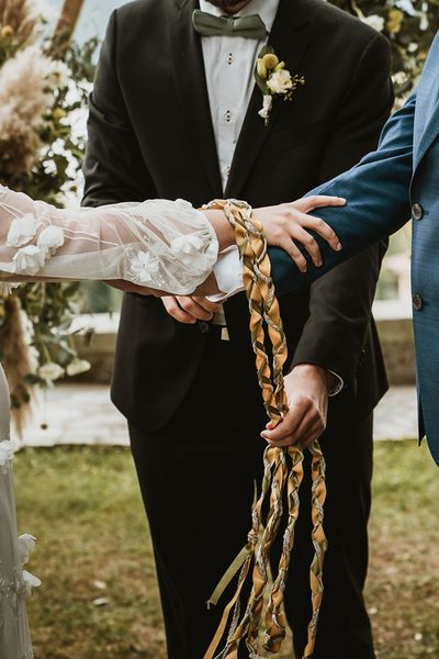 What is a Handfasting ceremony? We share everything you need to know, plus how to do it.