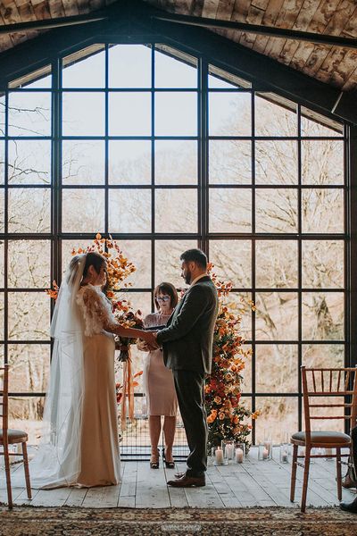 Hidden River Barn wedding in Carlisle with stunning large windows