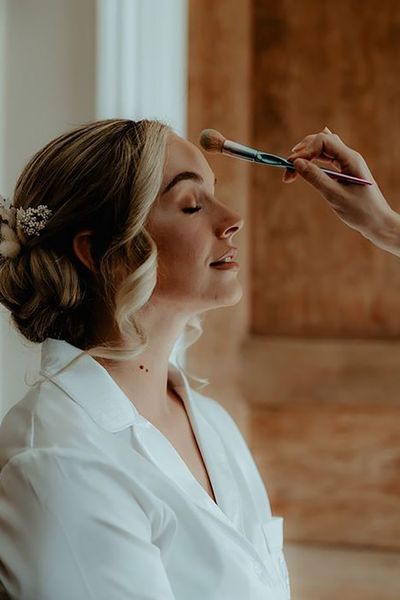 bride-gets-makeup-done-wedding-day-Patrick-Partridge-Photography