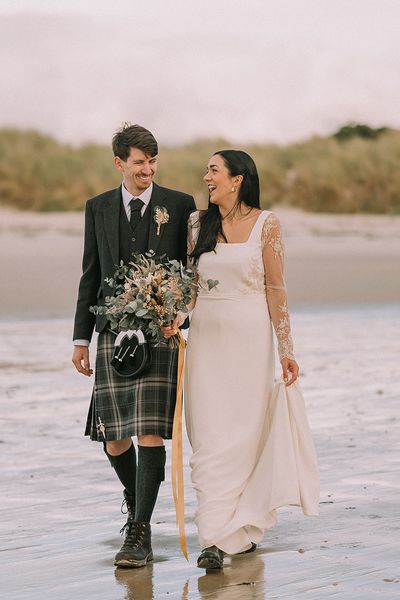 intimate beach scottish highlands wedding with bespoke wedding dress